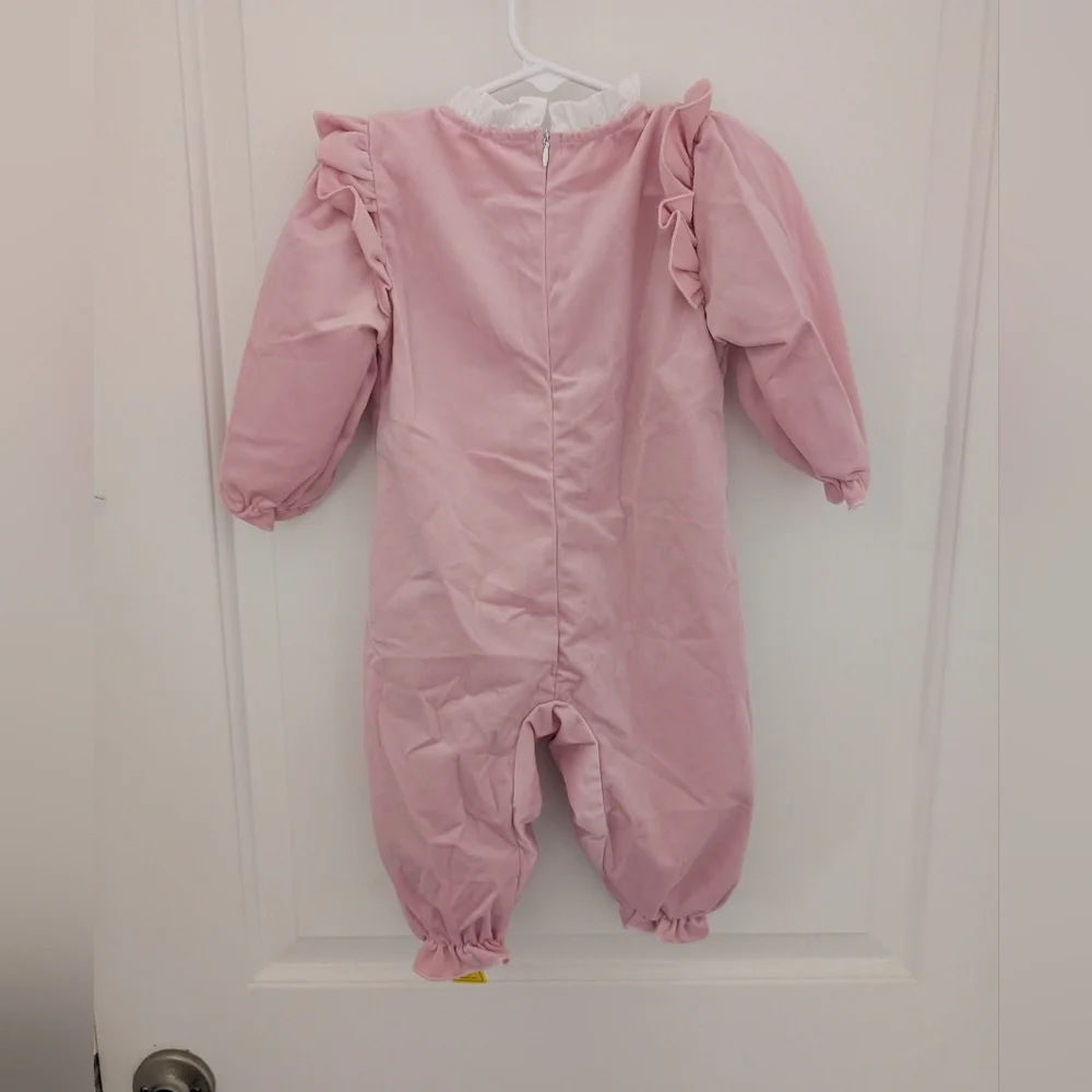 $ Pink Velour Jumpsuit With‎ Ruffle And Lace Bow Detail